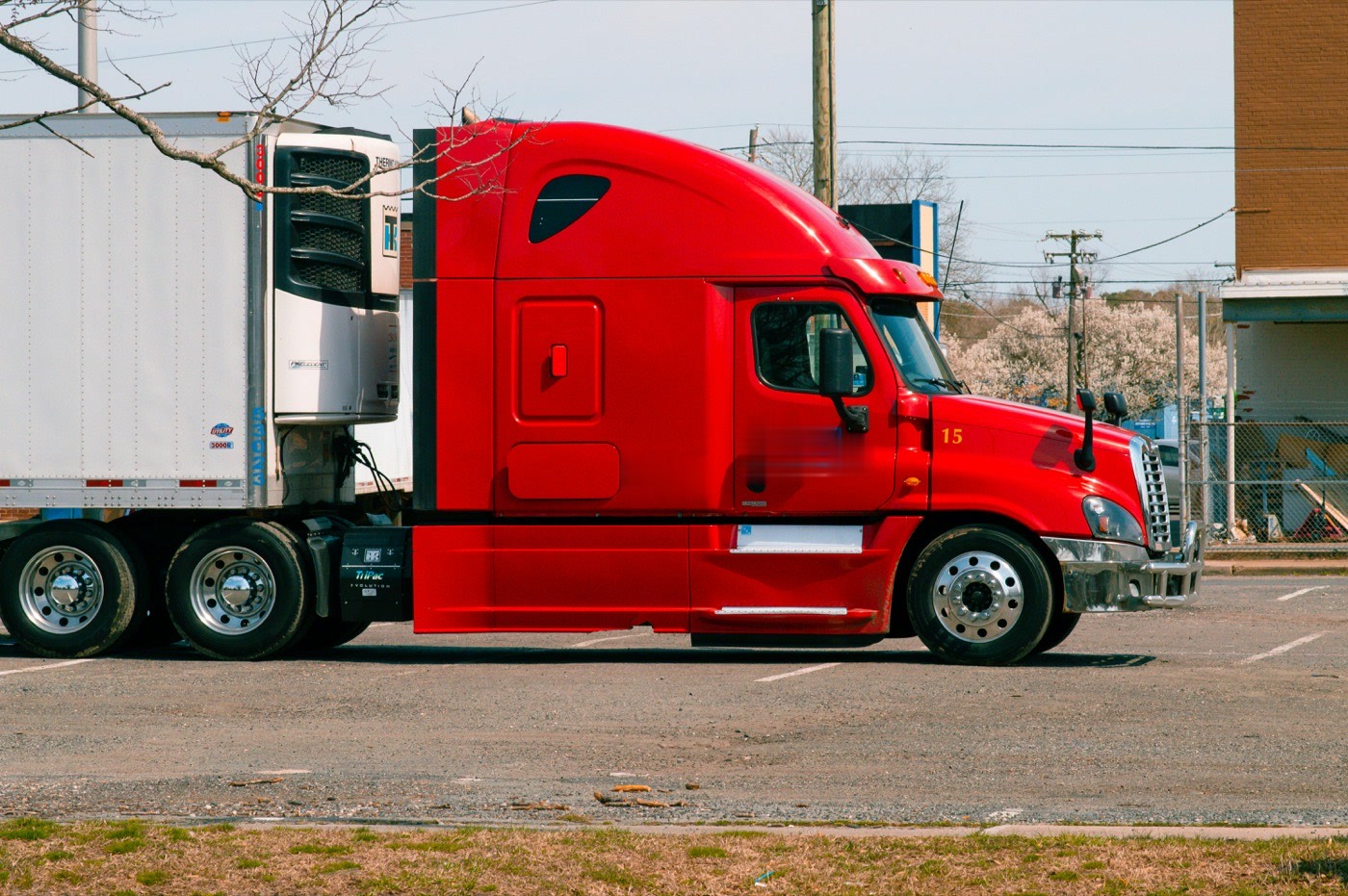 A tractor unit coupled to a refrigerated trailer