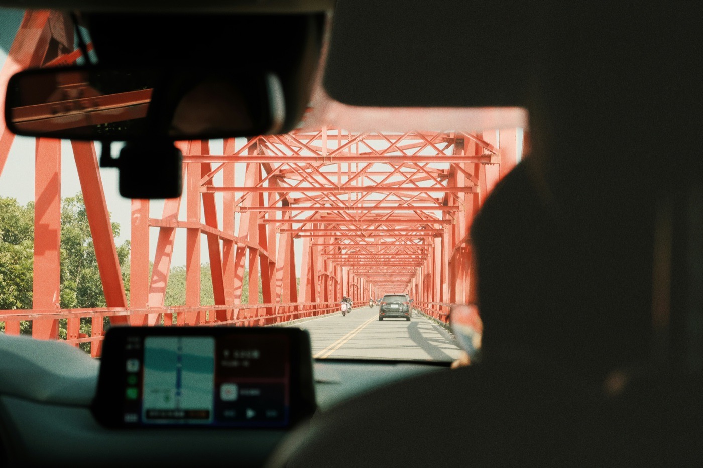 Driver's view of the road ahead through a windshield