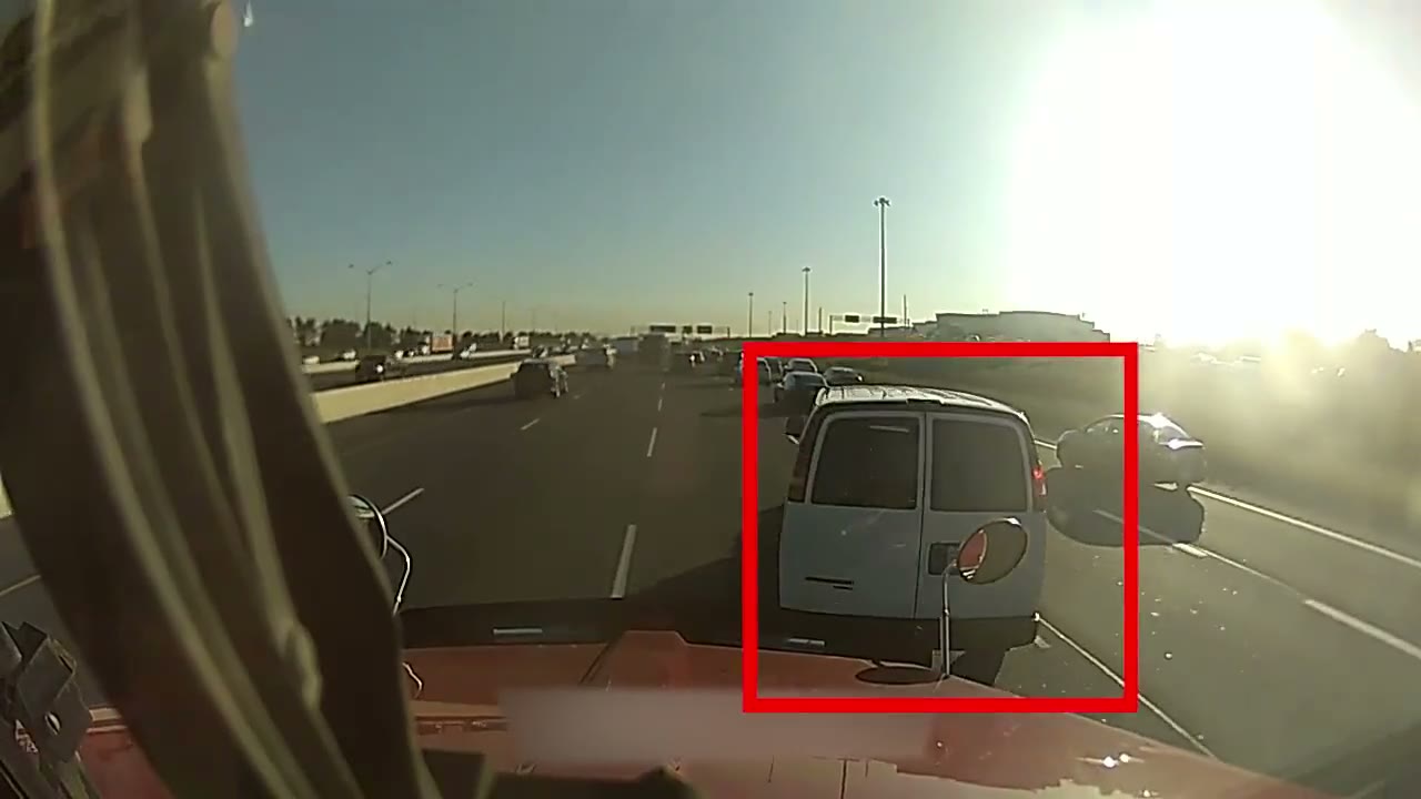 IQ-CAM road footage with a cutting-in vehicle flagged by collision warning